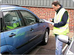 A VehicleSpa Inspector evaluates a Leased Vehicle