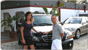 Jaime Niemann and Allen West outside of VehicleSpa