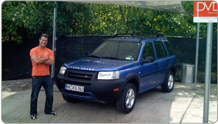 David Baumann and his SUV in VehicleSpa's Back Lot